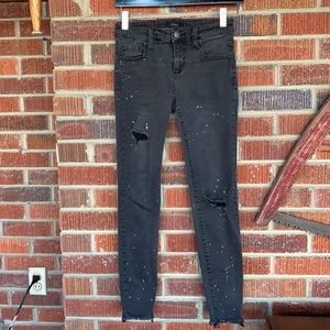 Cello black skinny jeans GUC raw hem paint splatters distressed